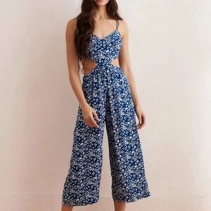 aerie blue and white floral jumpsuit with a cut-out back and sides.